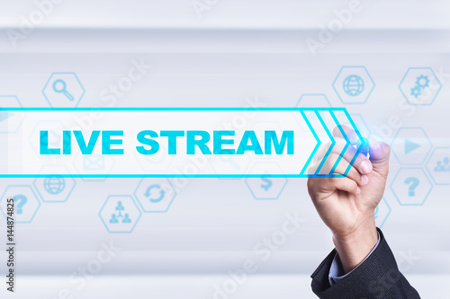 Businessman drawing on virtual screen. live stream concept.