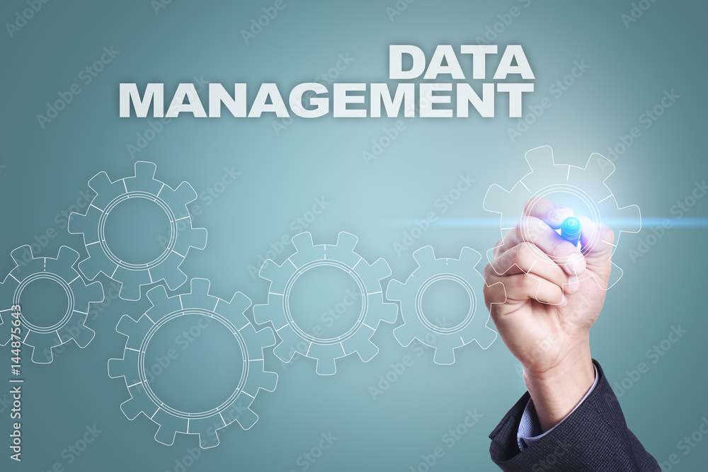 Businessman drawing on virtual screen. data management concept Businessman drawing on virtual screen. data management concept