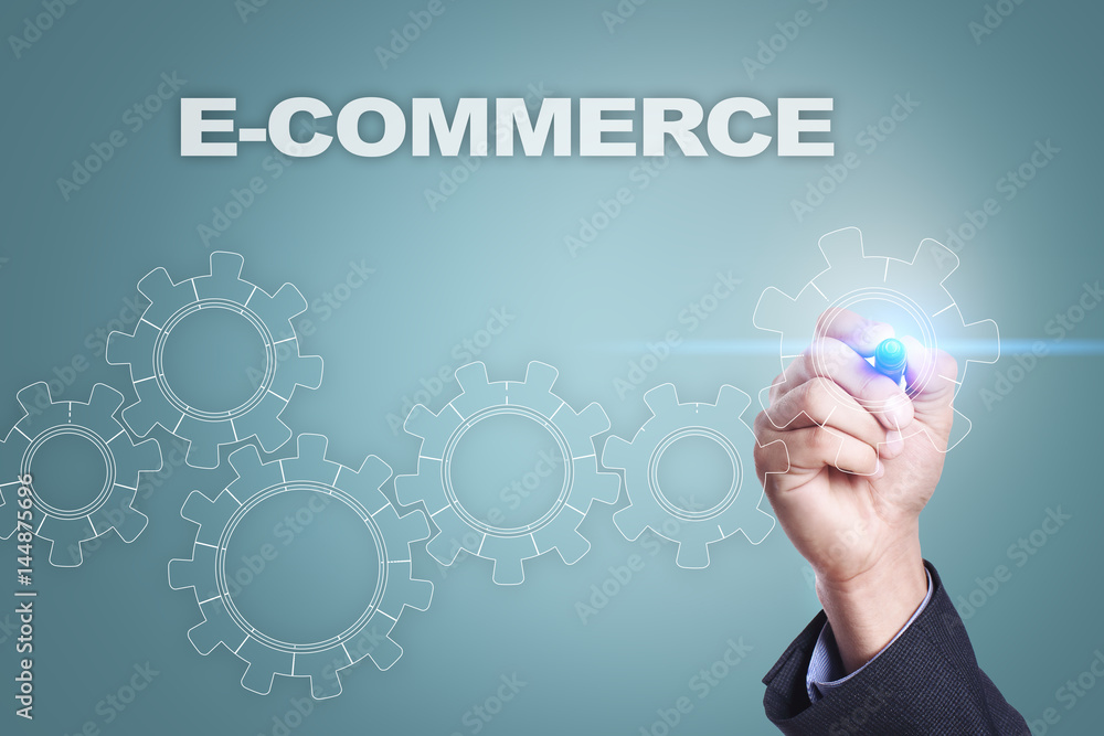 Businessman drawing on virtual screen. e-commerce concept Businessman drawing on virtual screen. e-commerce concept