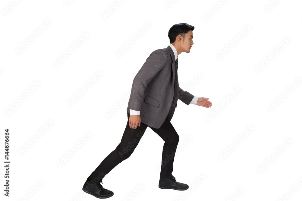 A young businessman at the starting line and ready to compete A young businessman at the starting line and ready to compete