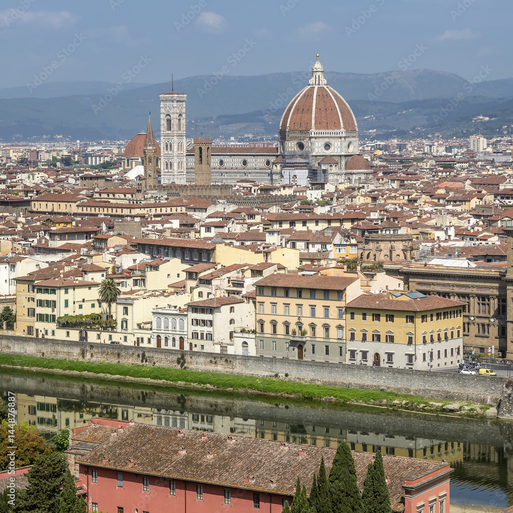 Beautiful aerial view of the Cathedral of Santa Maria del Fiore in the historic center of Florence, Italy, from Piazzale Michelangelo, on a sunny day