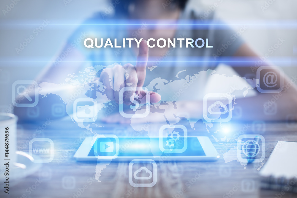 Woman using tablet pc, pressing on virtual screen and selecting quality control Woman using tablet pc, pressing on virtual screen and selecting quality control