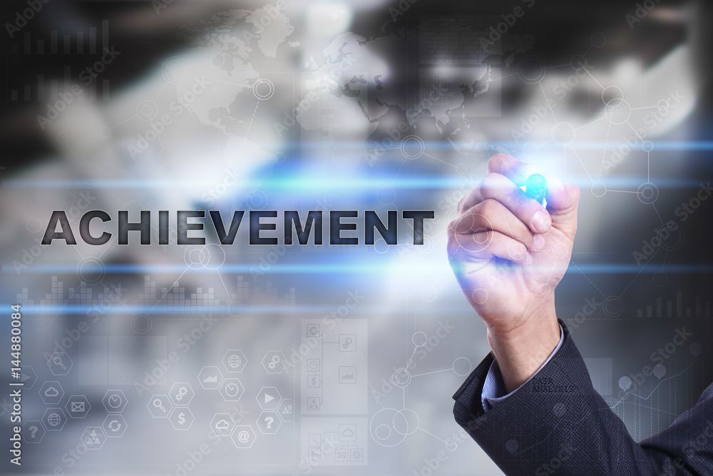 Fototapeta premium Businessman is drawing on virtual screen. achievement concept.