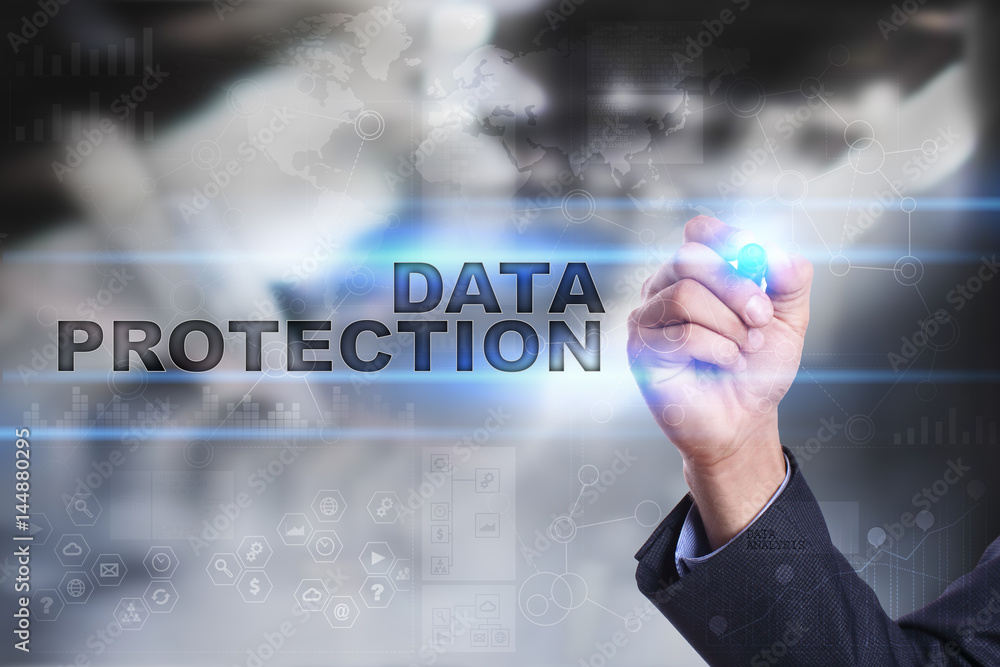 Businessman is drawing on virtual screen. data protection concept. Businessman is drawing on virtual screen. data protection concept.