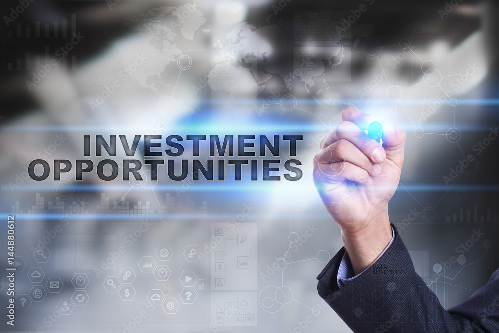 Businessman is drawing on virtual screen. investment opportunities concept. Businessman is drawing on virtual screen. investment opportunities concept.