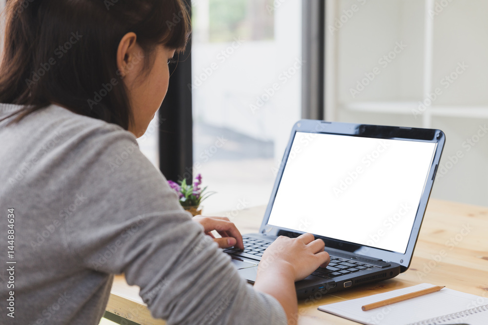 asian girl female teenager studying at school. Student typing on laptop computer - education and learning concept asian girl female teenager studying at school. Student typing on laptop computer - education and learning concept