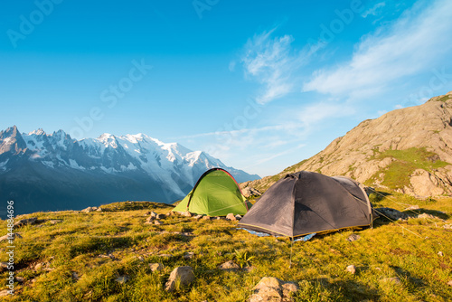 Obraz na płótnie Two tents in the mountains in the Alps, Europe (still life coach, company, friendship, background - concept) w salonie