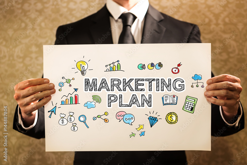 Marketing Plan text with businessman Marketing Plan text with businessman
