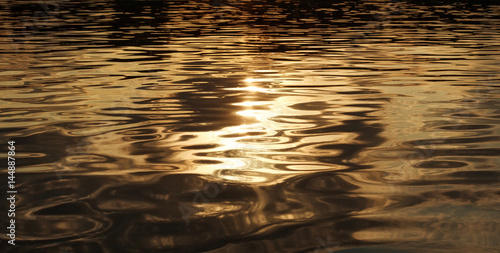 Golden abstract water background, natural photo