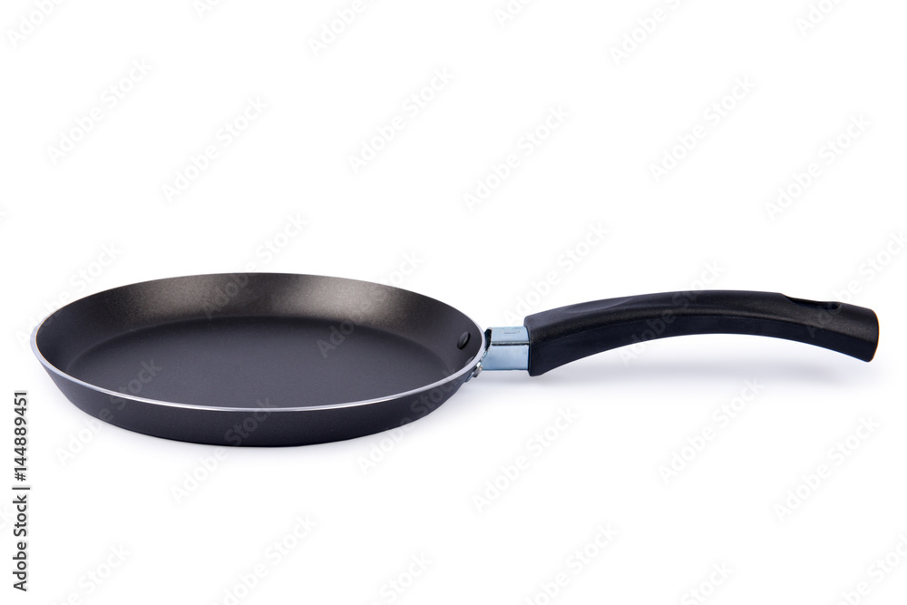 Cast frying pan isolated on white