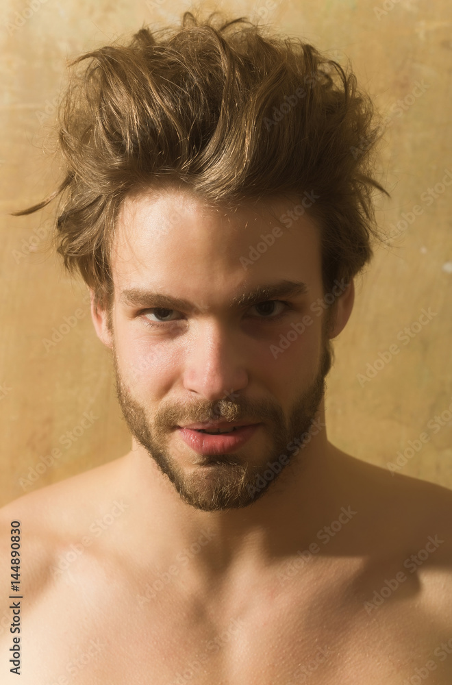 Obraz premium Handsome bearded man with beard and stylish haircut