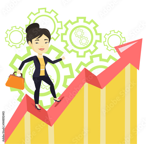 Happy business woman standing on profit chart. photo