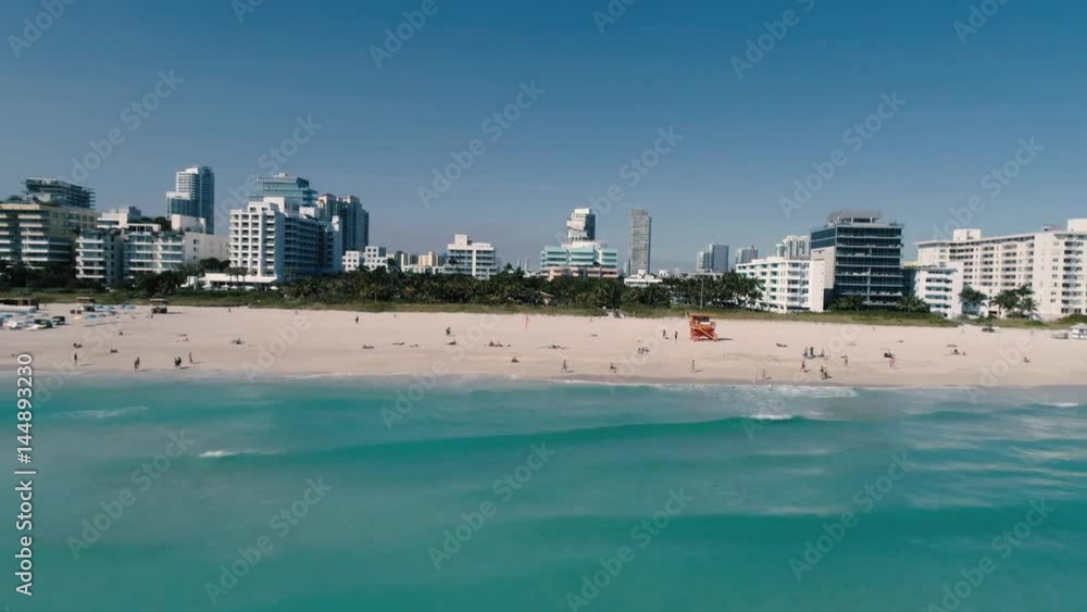 Miami aerial view, south beach, opening shot, reveal, beach sand, royal blue ocean 4K Miami aerial view, south beach, opening shot, reveal, beach sand, royal blue ocean 4K