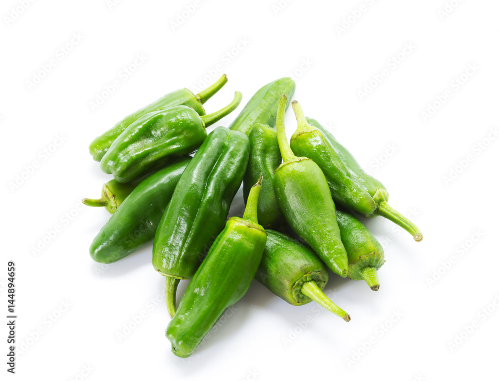 Green peppers isolated on white. Green peppers isolated on white.