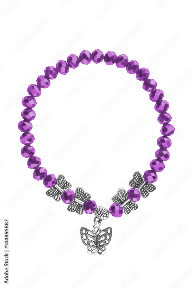 Elastic bracelet with purple irregular beads and silver butterflies charms, isolated on white background, clipping path included.