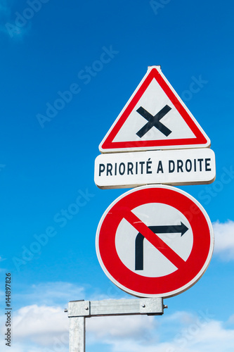 French sign prohibiting a right turn and the priority right photo