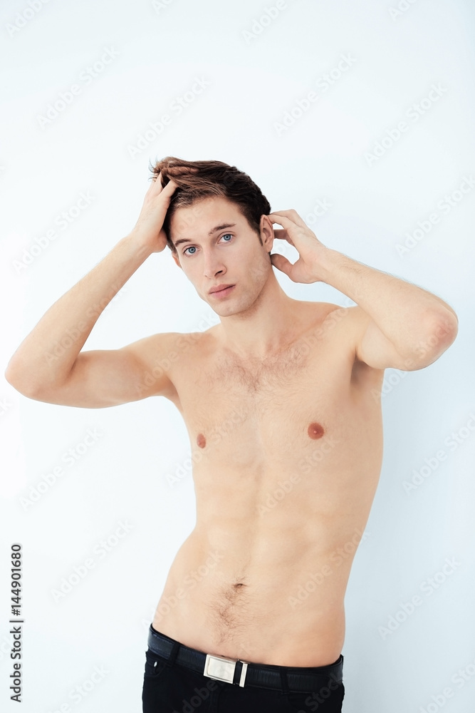 Obraz premium Handsome young man on light background