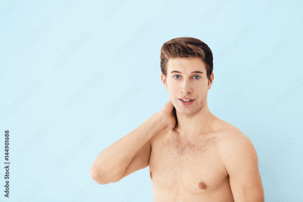 Fototapeta premium Handsome young man on light background