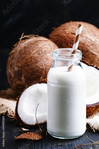 Coconut milk, rustic style, selective focus