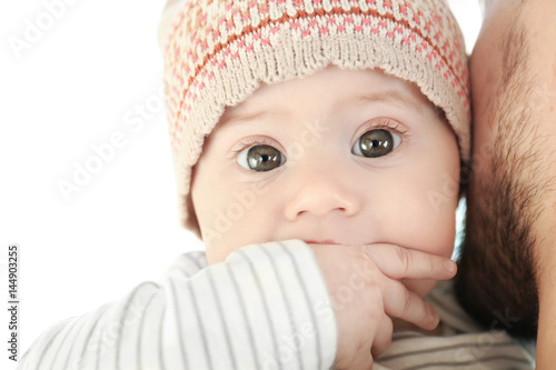 Adorable baby with young fa...