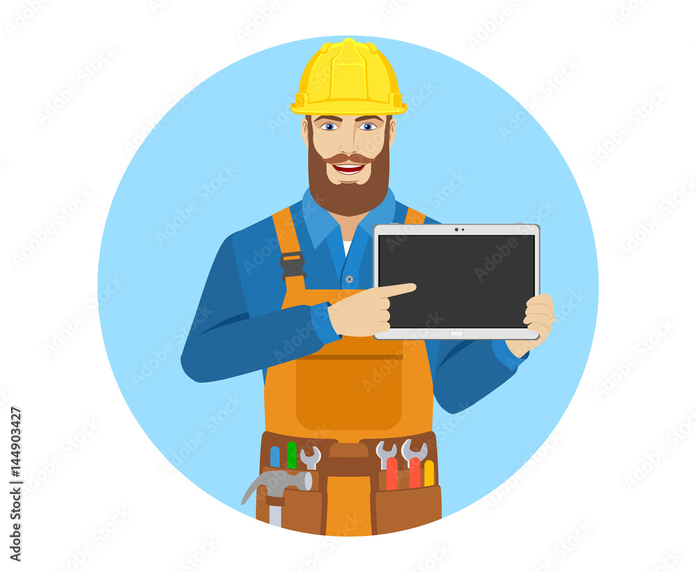 Worker pointing at digital tablet PC Worker pointing at digital tablet PC