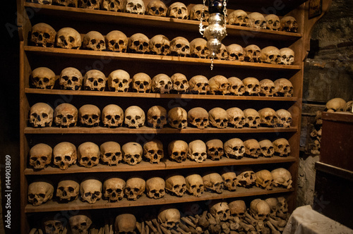 Obraz na płótnie 2016, Greece Meteora, wall of skulls inside one of the monasteries w salonie