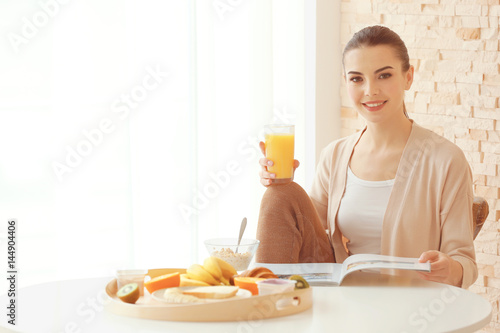 Beautiful young woman havin...
