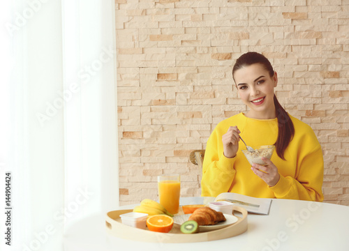 Beautiful young woman havin...
