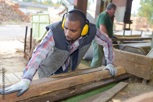 Man working in sawmill