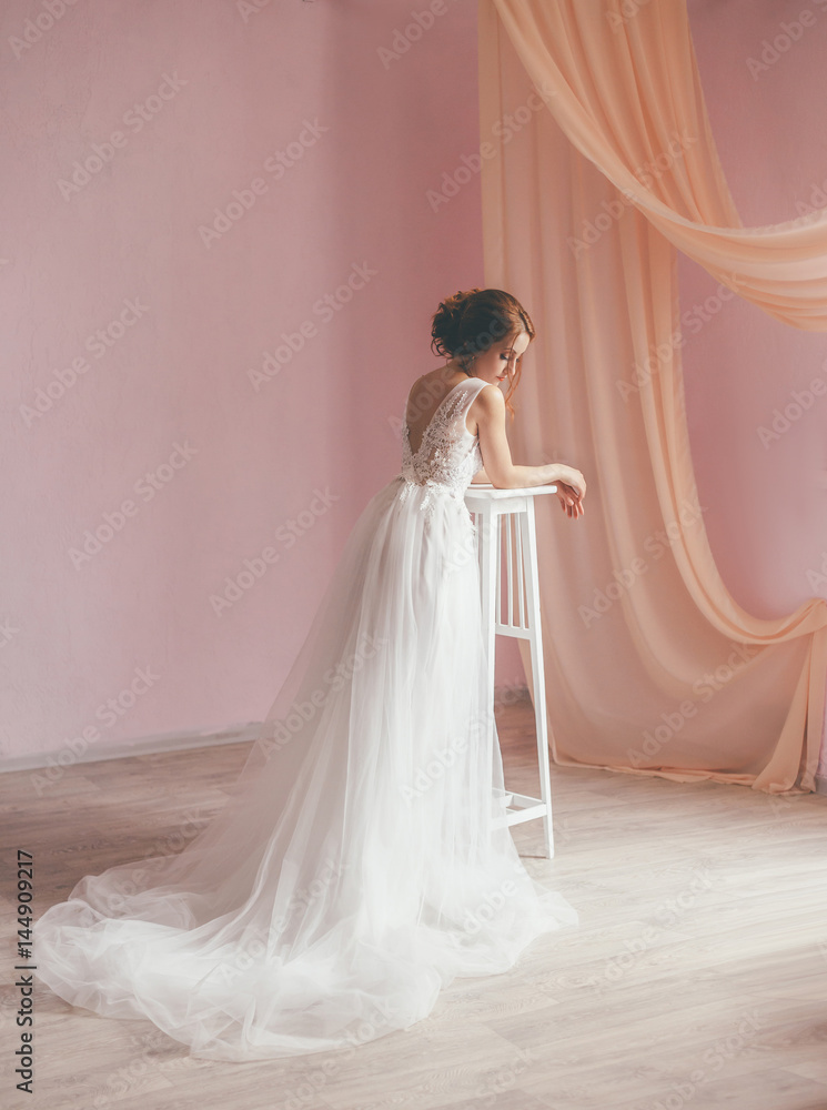 Young girl in spring in a luxurious white dress. Processing in the style of fantasy Young girl in spring in a luxurious white dress. Processing in the style of fantasy