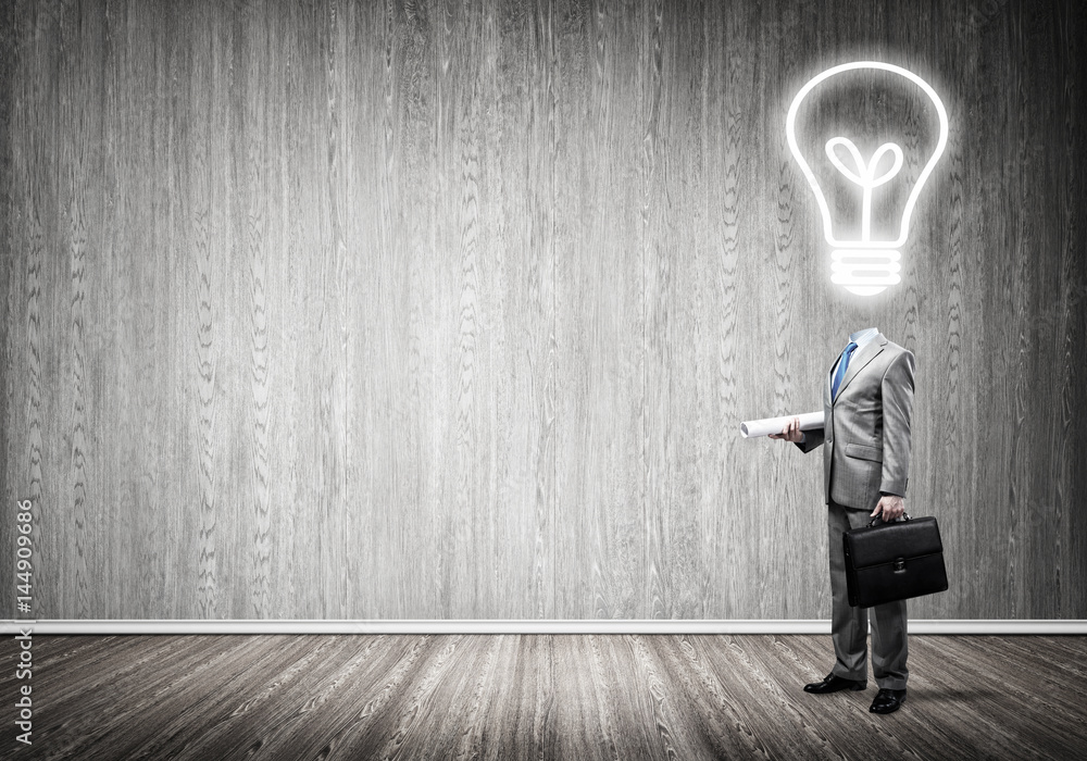 Obraz premium Bulb headed businessman