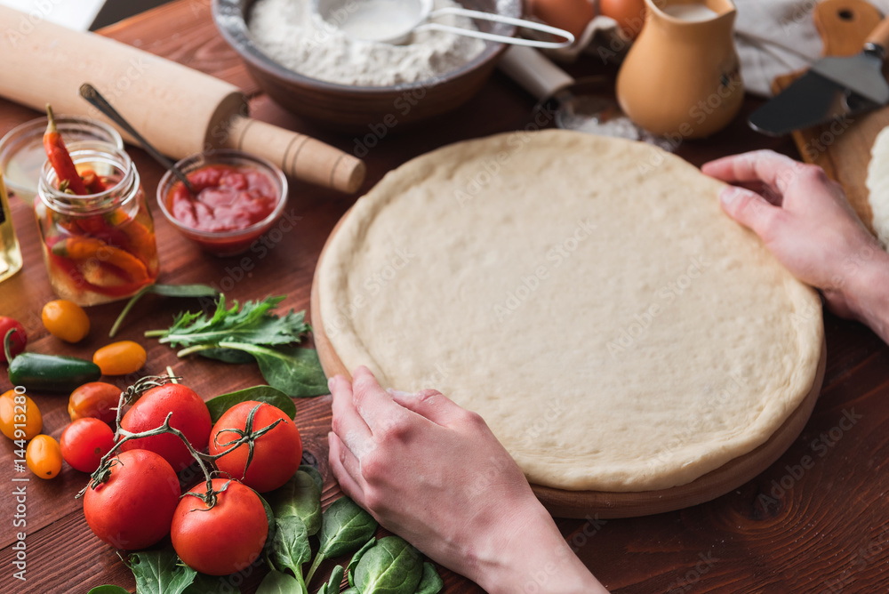 Step-by-step boss makes a pizza margarita. Dough and pizza ingredients Step-by-step boss makes a pizza margarita. Dough and pizza ingredients