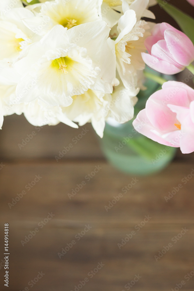 Pink tulips on the wooden background. Pink tulip. Tulips. Flowers. Flower background. Flowers photo concept. Colored tulips. Petals. Narcissus