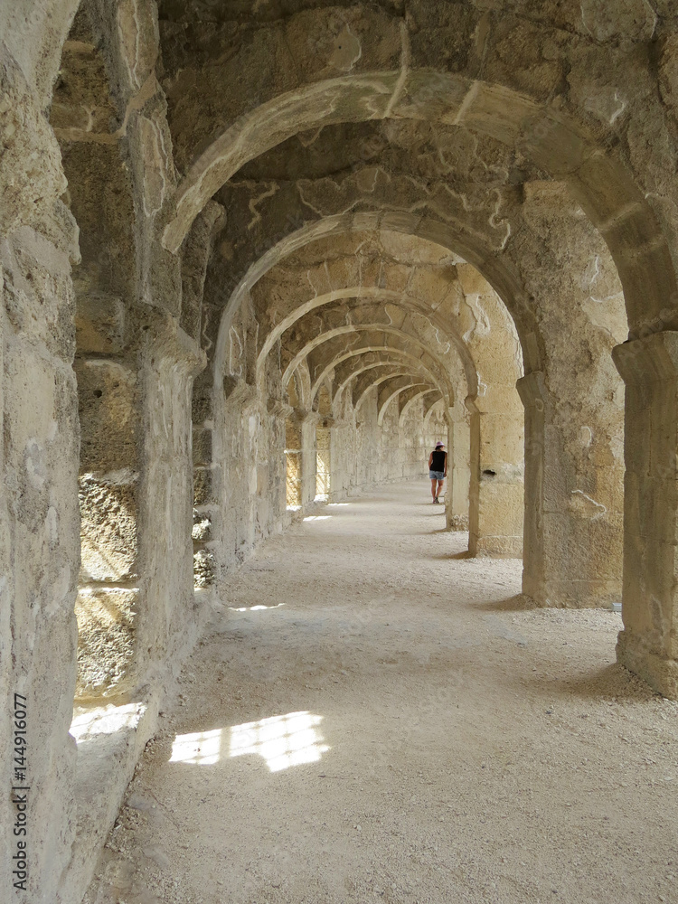 Arched gallery of the best-preserved theatre of antiquity in Aspendos, an ancient Greco-Roman city in Antalya province of Turkey.     