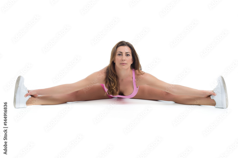 Healthy young fitness personal trainer woman warm up before sport training. Active lifestyle female isolated on white.