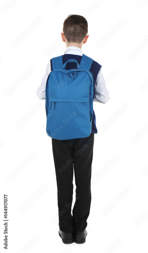 Incorrect posture concept. Cute schoolboy with backpack on white background Incorrect posture concept. Cute schoolboy with backpack on white background