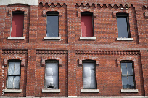 facade view of old brick building in the city