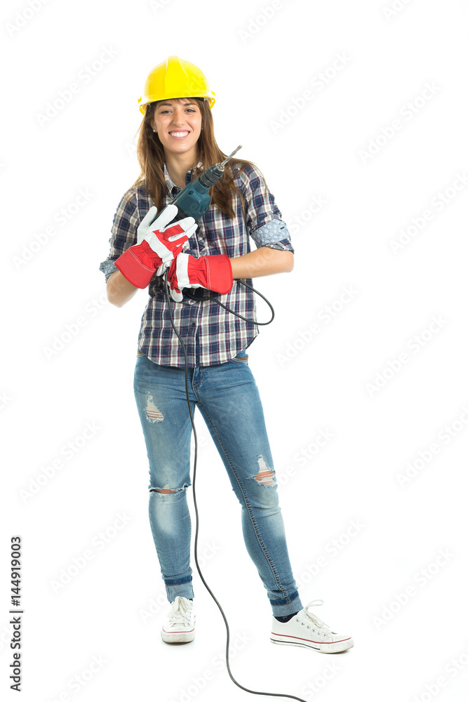 Attractive young woman builder with drill tool happy for good work. Isolated on white background. Attractive young woman builder with drill tool happy for good work. Isolated on white background.