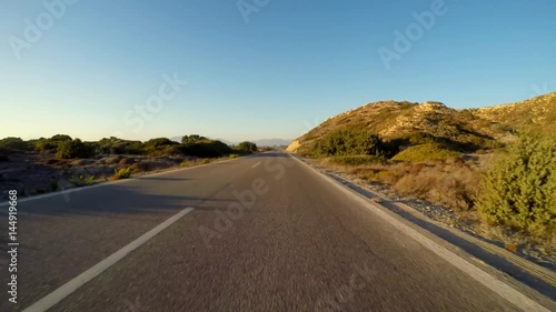 Drivers View on a ocean road  On-board-camera. Greecian rural road (Rhodes). Part 2/3 photo