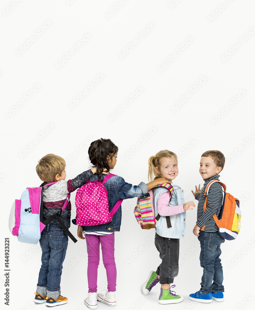Little Children Carrying Backpack School