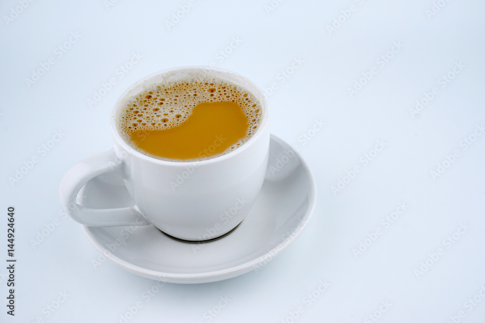 Teh Tarik (Hot Milk Tea) on white background. Teh Tarik (Hot Milk Tea) on white background.