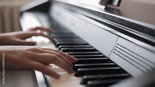 Hands playing piano