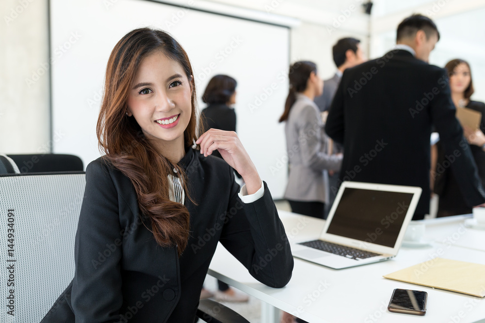 Young Business woman in conference room Young Business woman in conference room
