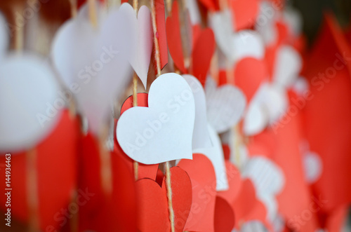 Many paper red and white hearts for Valentine day background © kyrychukvitaliy
