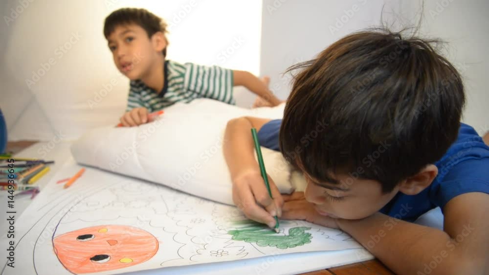 Little boy draw and painting pencil color on the paper home activities Little boy draw and painting pencil color on the paper home activities
