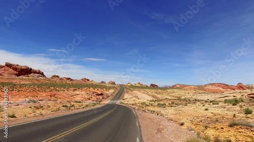 Incredibly beautiful landscape in Southern Nevada, Valley of Fire State Park, USA. Smooth camera movement along the road. photo