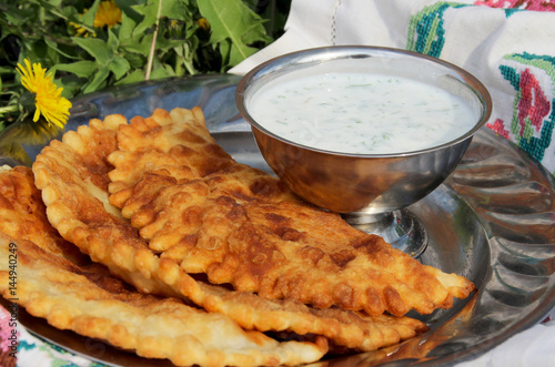 Hot fried chebureks. homemade baking photo