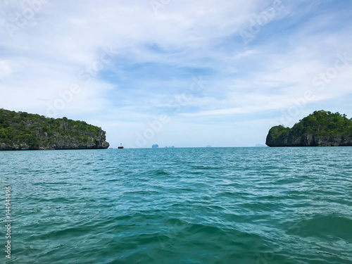 Fototapeta Naklejka Na Ścianę i Meble -  Island  under sun shine beautiful emerald sea and blue sky in summer of Andaman sea Trang province Thailand