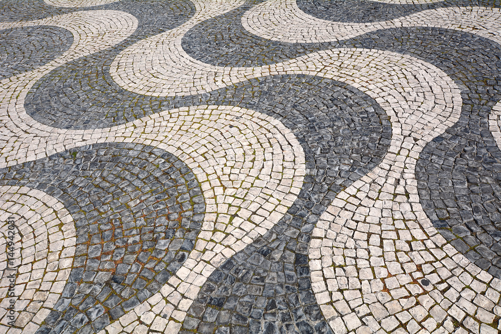 Detail of a cobblestone pavement - Lisbon, Portugal Detail of a cobblestone pavement - Lisbon, Portugal