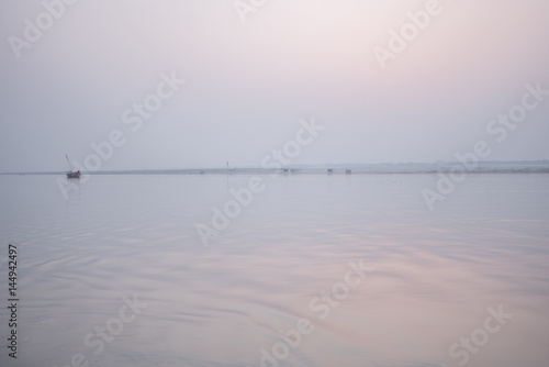 Misty dawn over the river Ganges  Varanasi.